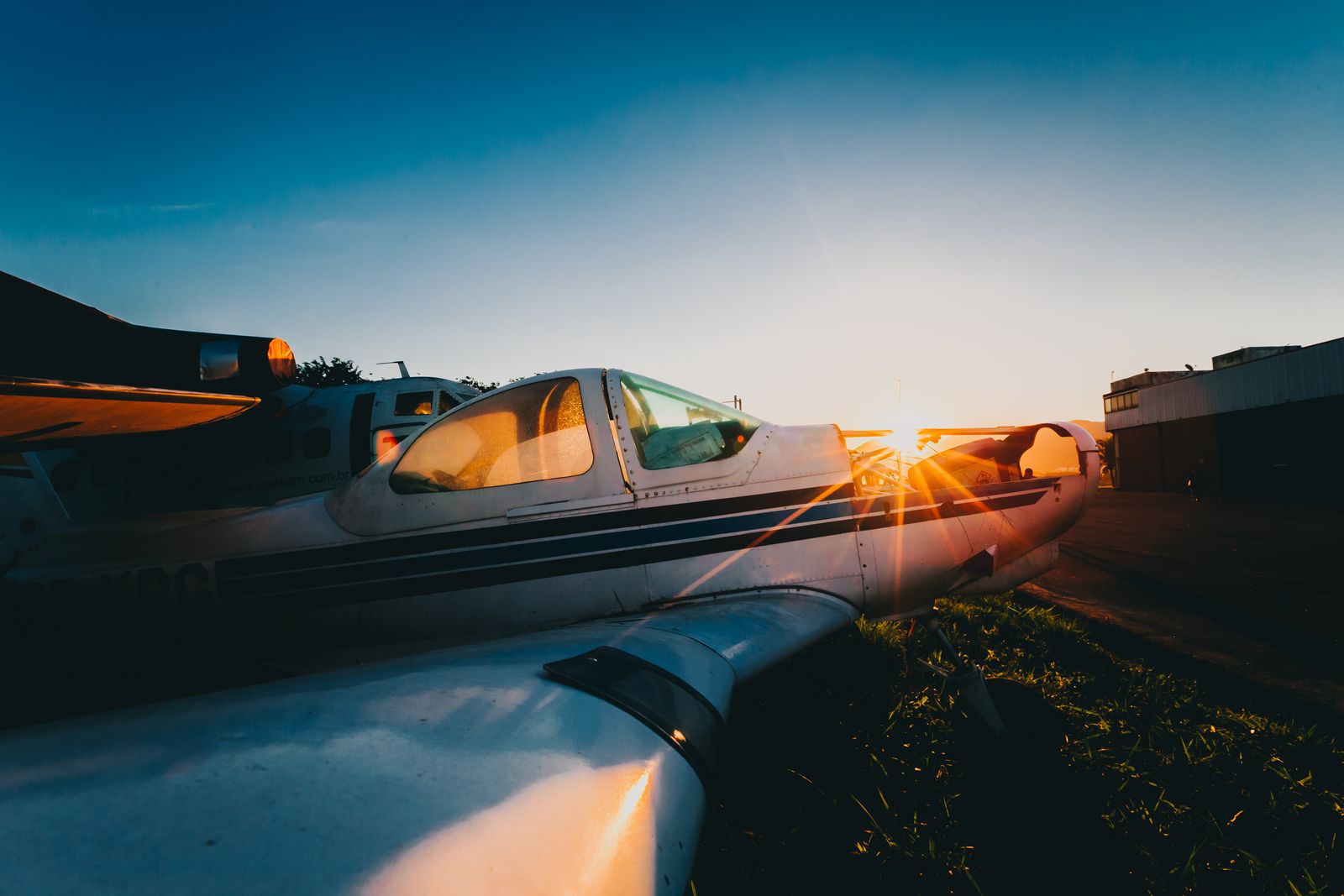 Parked aeroplane on the ground in daylight
